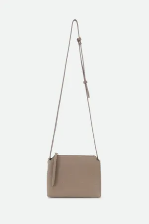 BRIDGET ITALIAN LEATHER CROSSBODY BAG IN TAUPE soft motion BRIDGET ITALIAN LEATHER CROSSBODY BAG IN TAUPE bold ease