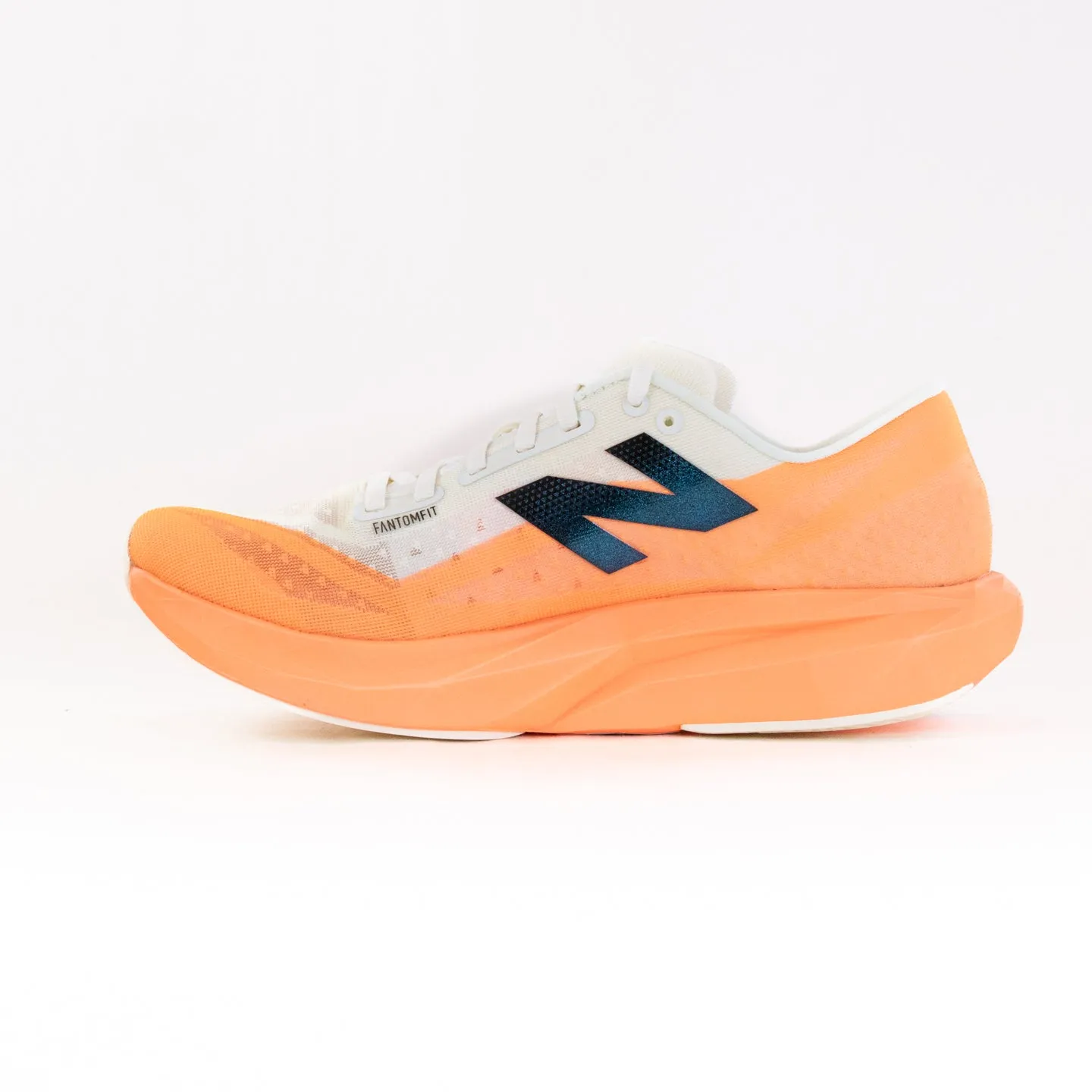 New Balance FuelCell Rebel v4 (Women's) - Orange/Beige stretch knit